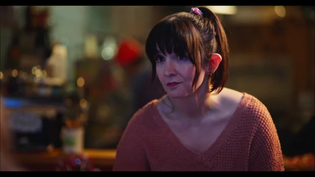 Lia in a bar scene in Vampire, Esq.